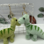 New Plush Tanystropheus Doll Keychain Little Dinosaur Doll Pendant Boutique Prize Claw Doll Supply Wholesale