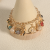 Luxury Women Charm Bracelet Gold Plated Bracelet with Crystal Beads and high-heeled shoes