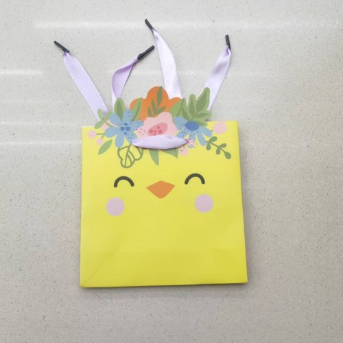 新优惠销售白卡纸卡通小尺寸礼品袋手提袋纸袋