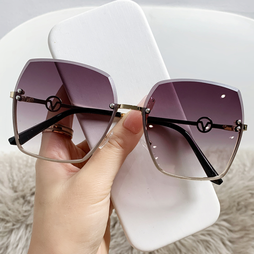 New Frameless Trimming Sunglasses Women‘s Fashion Metal Large Rim Sunglasses Driving Sun-Shade Glasses 90151