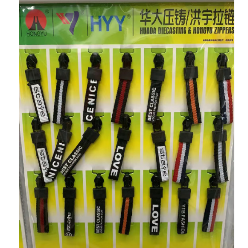 HYY义乌市华大压铸洪宇拉链厂家直销防水拉链皮头 皮标 织带拉头