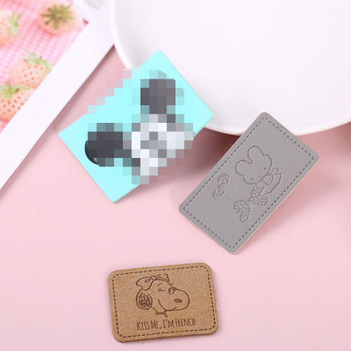 服装家纺pu仿皮商标手工皮牌 图案字母标签 超纤压花皮标丝印logo