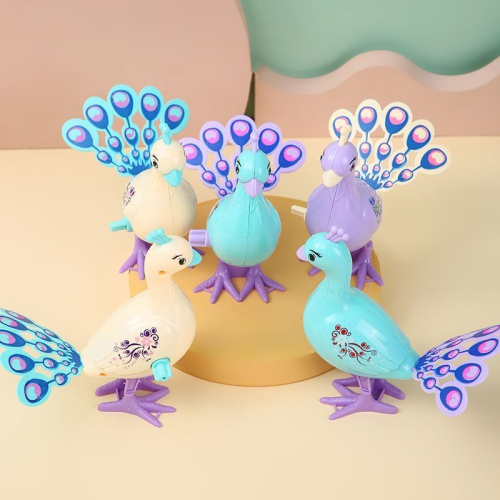 Spring-powered peacock toy; fun peacock toy for children