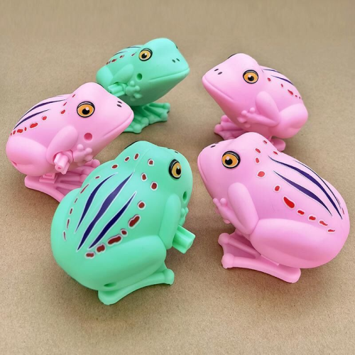 Spring-powered jumping frog toy; lifelike animal toys