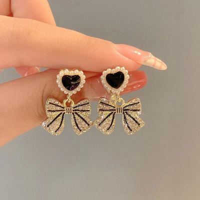 South Korea Retro French Pearl Bow Enamel Earrings Women's New Gentle Temperament Sterling Silver Needle Earrings Fashion