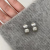 New All-Matching Graceful Concave Pearl White Stud Earrings S925 Anti-Silver Needle Korean Style Personalized Wild Earrings Earrings Wholesale