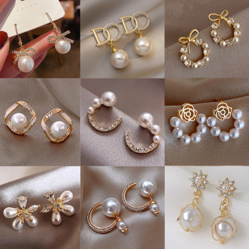 2025 new simple graceful pearl bow earrings high sense all match pearl stud earrings wholesale
