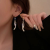 Dongdaemun New Trendy Light Luxury Design Full Diamond Cross Tassel Ear Hook Female Simple Personalized All-Match Slimming Earrings