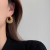 European and American Ins Style Design Metal Winding Ear Ring New Niche Metal Spring Hollow Circle Ear Clips Earrings
