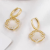Temperament Wild Xiangyun Safety Lock Earrings for Women Summer New Niche Design Cat's Eye Earrings Personalized Earrings