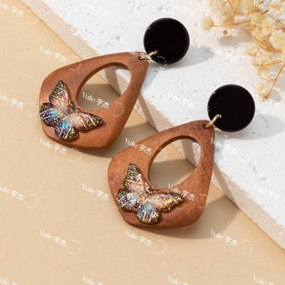 Women's butterfly wood piece earrings