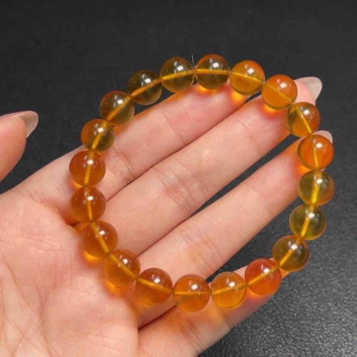 琥珀蜜蜡手串 货品总重约9.49克 卡9.7mm左右工艺品