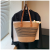 Grass woven bag for women in 2024, new summer commuting single shoulder tote bag, casual high-capacity woven portable bu