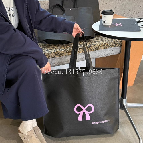 高级服装店无纺布手提袋女装购物大容量包装袋子衣服打包定制批发