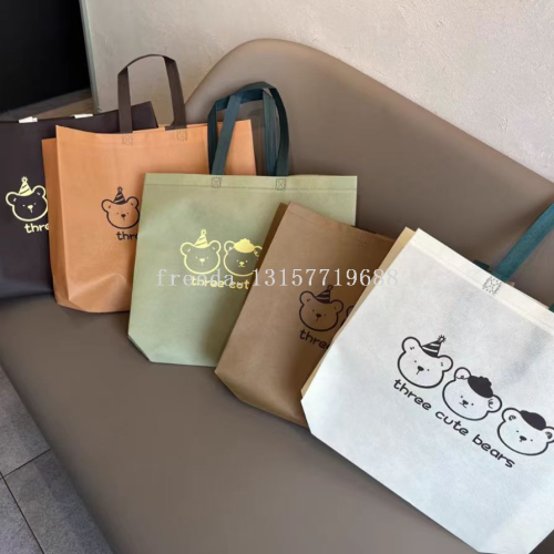 高级新款服装店手提袋子无纺布袋可印刷logo童装男女童装购物袋子