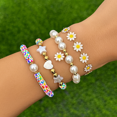 Resort-style soft clay beaded set, colorful bracelets with a bohemian flower design, simple bangles