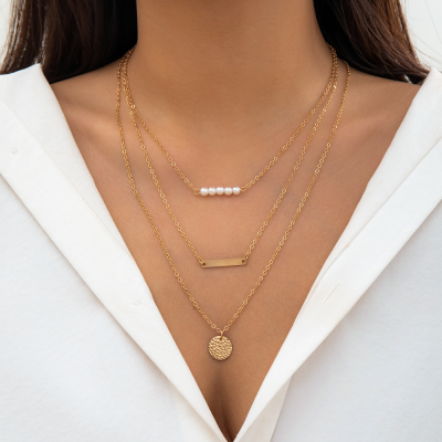 Versatile imitation pearl necklace with a sweet and cool multi-layered, simple water diamond and tassel design, creating
