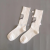 Spring Style Sports and Leisure Socks Black and White Solid Color Thin Letters Tube Socks Comfortable Breathable Fashion All-Match Stockings