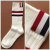 Socks Women's four-bar mid-tube socks solid color cloth label stripe knee-high calf socks jacquard over-the-knee stockin