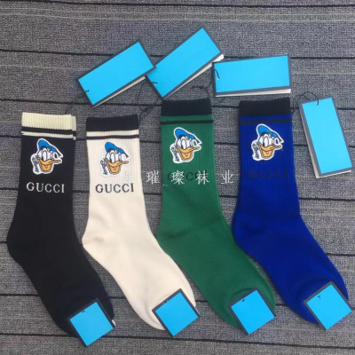 Four seasons men's and women's socks embroidery letter socks solid color horizontal stripes in the tube socks cartoon ca