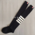 Men's and women's socks with four bars long socks solid color cloth label stripe knee socks over the knee leg socks whol