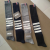 Men's and women's socks with four bars long socks solid color cloth label stripe knee socks over the knee leg socks whol