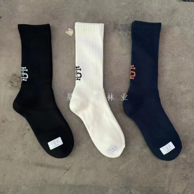 Socks men's and women's same towel bottom mid-tube socks solid color jacquard letter casual socks Japanese cotton sports