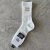 2024 Spring and Summer Socks Female Mulberry Silk Tube Socks Black and White M Stripe X Fashion Trendy Socks