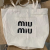 New MiuMiu Miu Miu Canvas Bag Portable Shoulder Bag Student Mummy Bag Shopping Bag Gift Canvas Bag