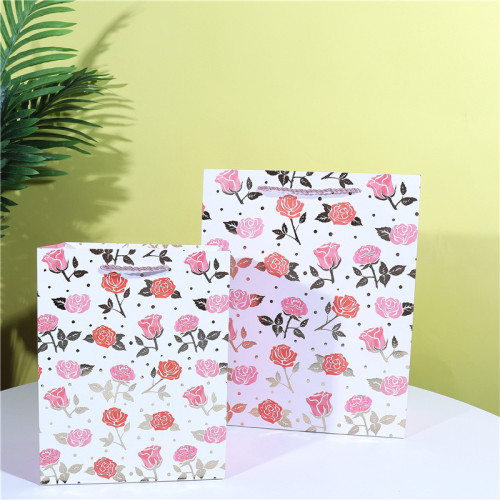 新款情人白卡纸手提袋纸袋现货批发跨境专供七夕节情侣购物袋礼袋