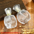 In Stock Wholesale Oval Thick Bottom Glass Perfume Bottle 30ml Transparent Press Fine Spray Travel Bottle Acrylic Cover