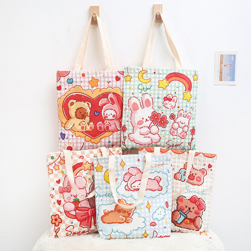 新款原创可爱卡通手提ins学生外出帆布包文件文艺补习单肩袋