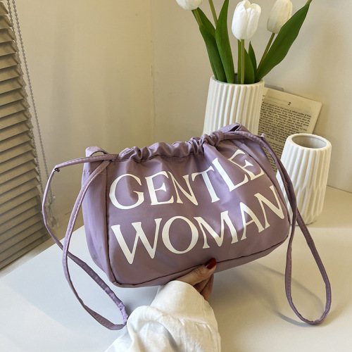 小清新彩色饺子包包新款休闲印花字母抽绳单肩包