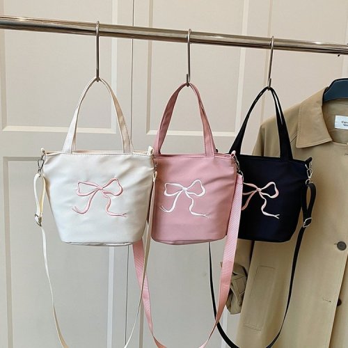 蝴蝶结刺绣水桶包女新款甜美洋气手拎包通勤腋下手提斜挎包