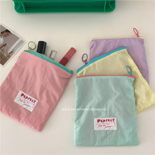 创意收纳袋马卡龙撞色旅行便携轻薄化妆包耳机数据线手拿小收纳包