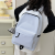 new school bag female junior high school student large capacity solid color travel backpack men high school and college student campus lightweight backpack