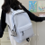 new school bag female junior high school student large capacity solid color travel backpack men high school and college student campus lightweight backpack