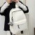 new school bag female junior high school student large capacity solid color travel backpack men high school and college student campus lightweight backpack